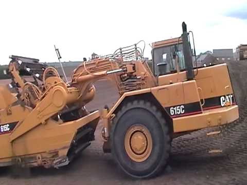Cat 615C Elevating scraper on stack