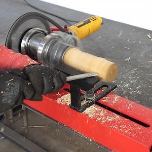 Angle Grinder HACK - How To Make A Homemade Woodworking Lathe Machine From Angle Grinder Hello Everyone! Today I show you how to make a lathe machine. I used metals to make this angle grinder powered homemade lathe machine. I also used sprockets to increase the torque of this homemade woodworking lathe machine. This homemade woodworking lathe machine is mini in size. This lathe is simple in construction and the output result from this mini lathe is just awesome. This homemade lathe machine reall