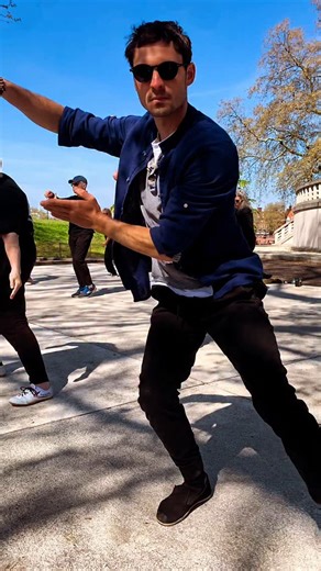 The Power of Group Practice ☝️ Practicing Tai Chi in a group creates a shared energy field, often called qi chang (气场) in Chinese. When multiple practitioners move together in harmony, the collective focus and breath rhythm can deepen each individual’s experience. • Synchronisation: Moving in unison sharpens awareness of timing and flow. You learn to match the pace of others, which refines your sense of rhythm and balance. • Motivation: A group provides encouragement. On days when energy is low,