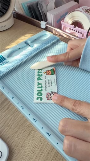 Milly Made 🌷 Cutesy Pet Art on Instagram: "Jolly Pets sticker flakes coming this TUESDAY at 1pm eastern time!! 🎄 I have more things coming- I’ll be sharing tomorrow!! ❤️ Something I’ve never had in my shop before hehe, can’t WAIT :) I’ve been working day & night to get some holiday stuff out (I feel like I take forever 🙄) but there’s just sooo much to it lol 😆 Drawing everything, exporting it into files, printing, cutting, making the packaging, FILMING IT… I might as well call myself an elf 