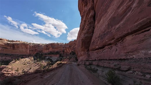 Hugging the canyon walls while descending Shafer Canyon Road in Utah. Fun fact: every video you see here was filmed by us while we were out on the road. #Utah #roadtrip #travel #worldofdrives | World of Drives