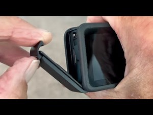 How to open the charging port door on GoPro Hero 13 Black