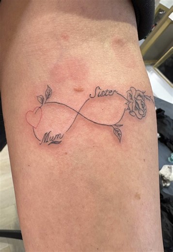 Fine line infinity piece for my client today — tying together Mum and Sister with a little heart and rose. Simple, clean and really personal to her. Loved doing this one. #FineLineTattoo #BradfordTattooArtist #InfinityTattoo