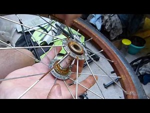 Bike trailer wheel hub maintenance