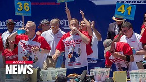 4.8K views · 84 reactions | ▪ HOT DOG EATING CONTEST World champion holds onto title at hot dog eating contest #hot_dog #eating_contest #Joey_Chestnut | Arirang News | Facebook