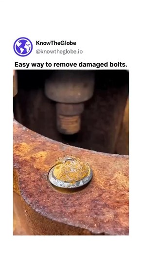 KnowTheGlobe on Instagram: "The video depicts a professional and efficient mechanical process for extracting a broken, rusted bolt from a heavy-duty industrial component. It begins with the use of a grinding wheel to smooth the irregular surface of the sheared bolt, providing a flat plane for precision work. A center punch is then applied to mark the exact middle, followed by a drill bit that bores a clean hole through the core of the bolt. The highlight of the demonstration is the use of a spec