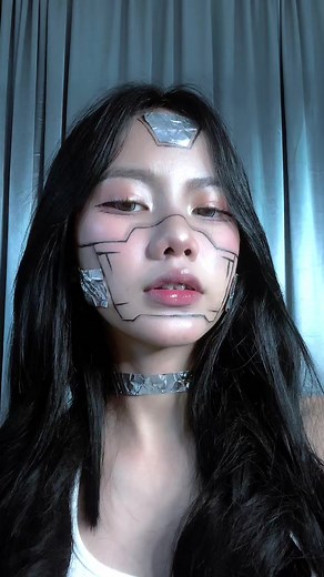 Person Styling Hair in Indoor Setting with Choker