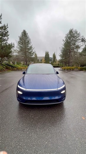2026 Tesla Model Y Juniper Exterior | Deep Blue Metallic in Rain