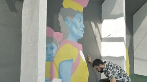 Man painting a mural - Free Stock Video