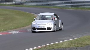 Volkswagen Beetle almost thrown while speeding on Nurburgring circuit