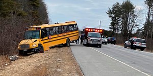 Students steer bus to safety after driver collapses at wheel