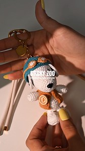 Carry your memories. In charm form. Your travel buddy. Your good luck charm. Your tiny moment of nostalgia. The EYE SNAP STACK CHARM blends a plush pilot pup, vintage camera, and protective evil eye. 🤎 For hearts that hold on. ✨ Grab yours now — and get 30% off today. https://sticky-zoo.com/products/eye-snap-stack-charm | Sticky Zoo