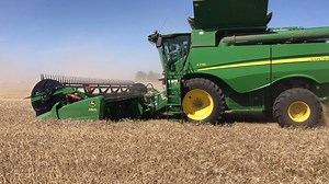 Mark Kennard and Marv Gottfried from our Sales team took this S770 combine with a 735FD header out southwest of Grace City. They were training on some of the tools the S Series has to offer, including the new multifunction control lever and 4600 Display. | Leading Edge Equipment