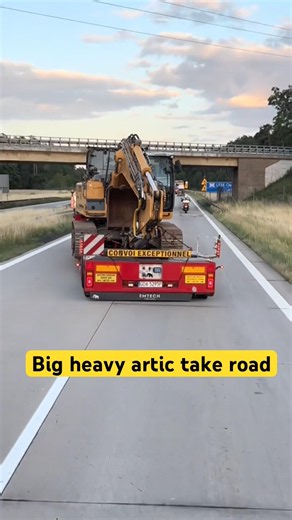 Massive semi-truck taking up two lanes