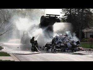 Firefighters Extinguish Garbage Truck Fire, Cool Off CNG Tanks in Saint James Church Lot