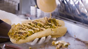 Explore Philly's underground food scene where unconventional combos like General Tso's cheesesteaks and seafood french fries take center stage. | Thrillist