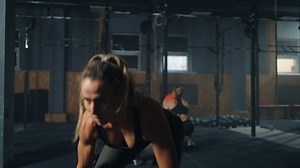 beautiful woman lifting weights in gym, deadlift and powerlifting, lady putting barbell on chest