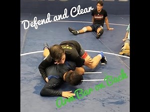 Defend and Clear out of an Arm Bar on Back