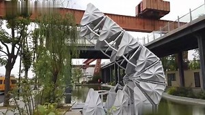 Wow! A #3Dprinted retractable bridge, the first of its kind in China, is seen in #Shanghai. With 9 retractile segments, the bridge is 9.34 meters long and weighs 850 kilograms, which could carry 20 people at the same time. #ChinaTech | Xi's Moments