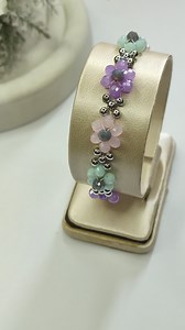 69K views · 2K reactions | Create a garden of sparkle on your wrist! In this tutorial, I’ll show you how to make a beaded bracelet using 4 mm rondelle crystal beads arranged in cute multicolor daisy flower patterns. Bright, fun, and perfect for any cheerful look! #tutorial #beading #beadedbracelet #craftideas #handmade | Krea3 | Facebook