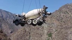 37K views · 411 reactions | Concrete mixer truck lifted by crane at dam construction site in Turkey! Join Us Engineers World | Engineers World | Facebook