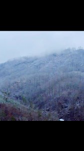 A quiet snow settled over Gatlinburg this morning… just enough to make the mountains sparkle. From Anakeesta to the Space Needle, the whole town looks like a winter postcard. #gatlinburg #snow #dronevideo | Gatlinburg LIVE