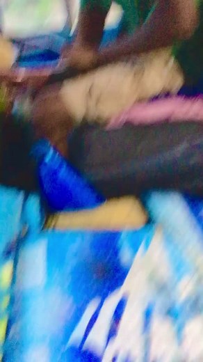 Driving Through a Scenic Route in a Green T-Shirt