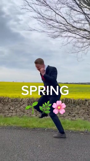 Dancing Man Celebrates Happy Spring Day in Fields