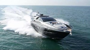The dazzling, spectacular Riva 88' Domino Super among the waves. | Riva Yacht