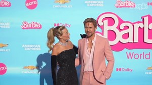 Margot Robbie Channels 1960s Barbie in Sparkly Black Dress and Gloves at L.A. Premiere