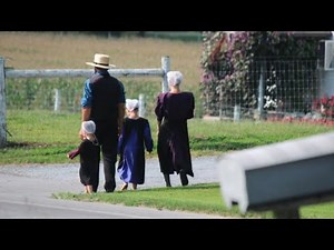 How do Amish get material and make their clothes