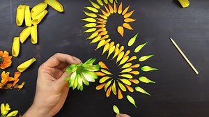 This guy's awesome flower petal art will soothe and entertain you