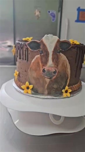 Our baker is so talented! She hand painted this fondant cow for this cake. This cake is absolutely stunning! Did you know that you can order custom cakes and desserts from us? Call our baker to discuss details. 541-570-1092 #chocolatecake #handpainted #baking #cakedecorating #cake | J&C BBQ and Catering