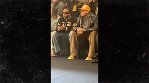 Quavo And Chris Brown Seated Next To Each Other At Paris Fashion Week
