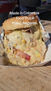 Made in Colombia Food Truck, Foley, Alabama Mamacorn Burger - Double burger, mozzarella cheese with corn, cabbage, potato sticks, ketchup, mustard, and bacon....oh my! Wait until you see the loaded fries! 📌 3910 S McKenzie St, Foley, AL Next to The Farmhouse Market off of hwy 59. Made in Colombia Al is a must try! #foley #foleyalabama #alabamagulfcoast #gulfshores #alabamabeaches | Gulf Coast Journeys