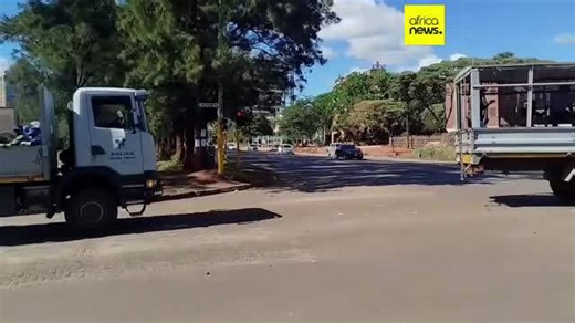 Zimbabwe charges dozens for taking part in protests against President