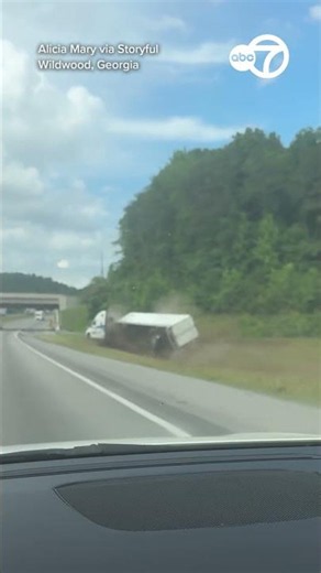 Dramatic Moment Semi-Trailer Flips Over on Georgia Freeway