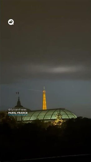 A lightning bolt strikes the Eiffel Tower, leaving a spectacular image.