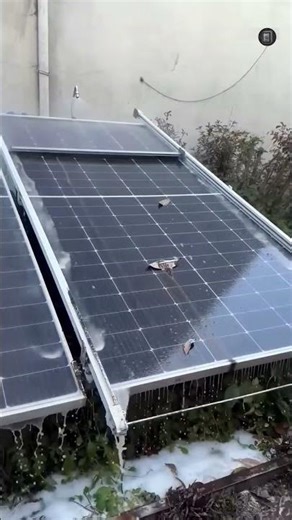 Automatic solar panel cleaning system