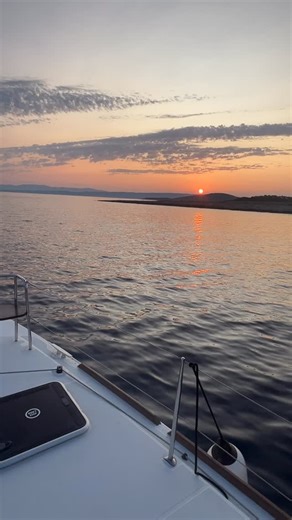 No big words needed. Just a quiet dawn on the Adriatic and good company.🌞 Send this to the person who came to mind.🌅 ⛵️👩‍❤️‍💋‍👨 #yachtchartercroatia #fairwindyachtchartercroatia #sailingadventure #sailinglife #sunrisephotography #catamaransailing #croatiasailing | Fair Wind Yacht Charter