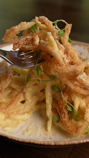 Start your next meal at PJ’s with our new Trofie Mac appetizer. We give our PJ’s mac sauce a new twist—topping it with crunchy buttermilk onion strings and fresh herbs. Try it today! | SentryWorld