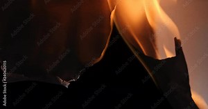 Pre-keyed alpha channel white paper on fire on transparent background.