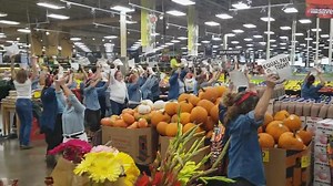 Women demand equal pay during protest at Northeast Portland Fred Meyer