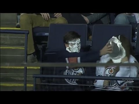 Edmonton Oilers fan gets pie in the face