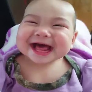 Fussy baby wants to cry but can't stop laughing