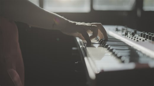 Close up of hands playing the keyboard - Free Stock Video