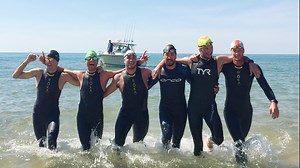 Swimmers return from 'epic' journey across Lake Michigan