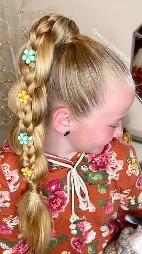 The prettiest and easiest ponytail style! Start with your ponytail, split it into three sections, split the center section into two braids, crisscross the two outside sections between the two braids, add a cute hair tie, and repeat! Pancake at the end for a fuller looking braid! Tag us when you try it! 💖 Cute hair ties from @goldendotlane 🌸 | Paisley’s Petals