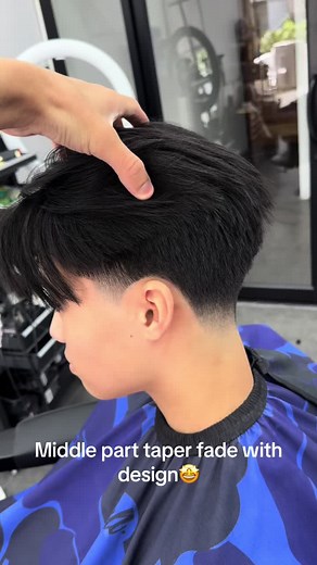 Middle Part Taper Fade with Design: Trendy Hairstyle Ideas