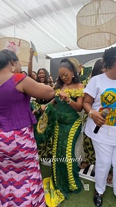 [ #Wedwithmcb ] Mother-In-Law spraying money on the bride😍💵🎉 #Mysoulfoundamate23* Bride: @dollydoll_wigxclusive_gh @king_kiyla Groom: @Gideon_nk *EVENT TEAM* Planner @alpha_krystal_ushering, @king_kiyla Planning and Coordination @purpletwilight__events ————————————————————————- Event styling/design @Kinanifloral Brides room decor @perfect_balloons_and_more Bride’s bouquets @neemadecor Bridesmaids bouquet @neemadecorr Groomsmen boutonniere @neemadecorr Wrapping dowry @impakerscreativehub_offic